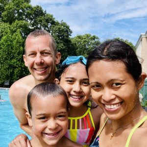 family enjoying the swimming pool